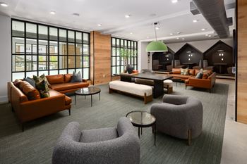 Clubhouse with a dry bar, movie lounge & innovation hubs